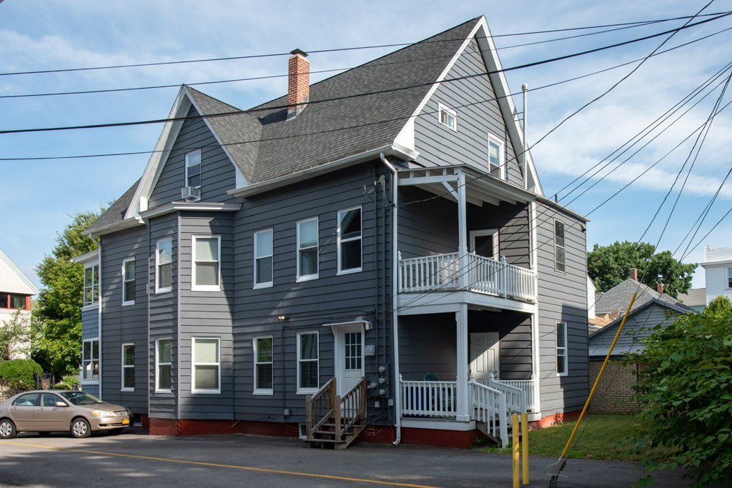 54 Sever St — classic blue three-family exterior